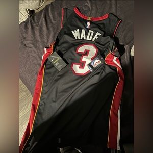 Dwayne Wade Jersey. Bought for $250, selling for $75 OBO. New and never worn!!